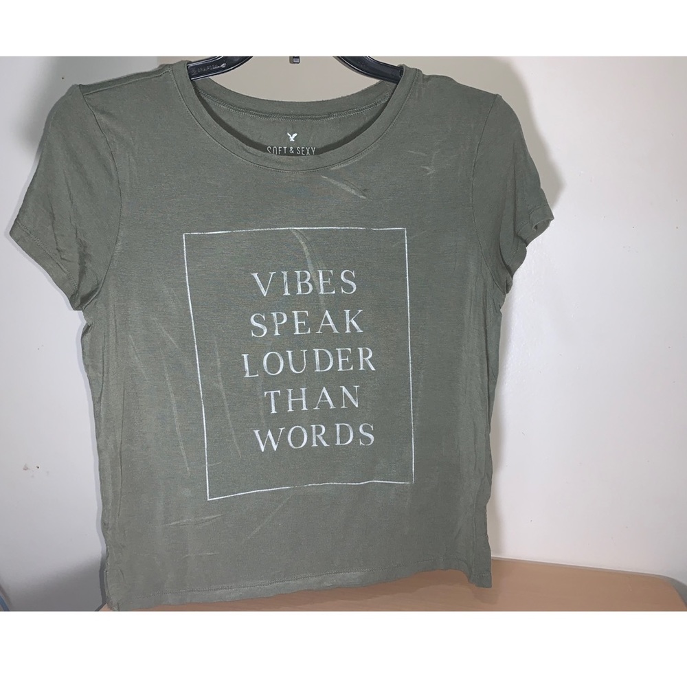 American Eagle Outfitters olive shirt.